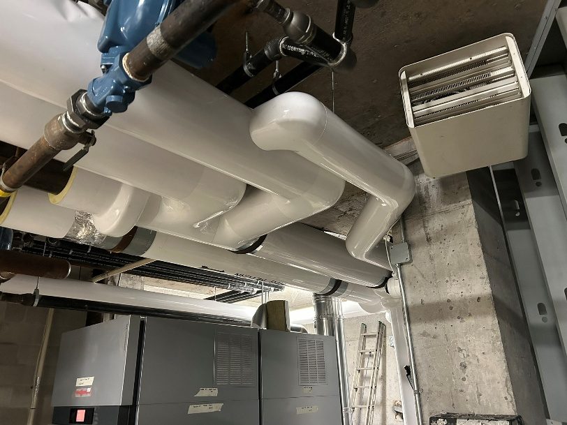 Mechanical room insulation repair on older equipment