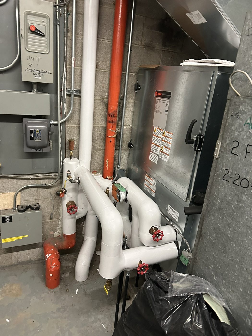Old school boiler room piping after insulation