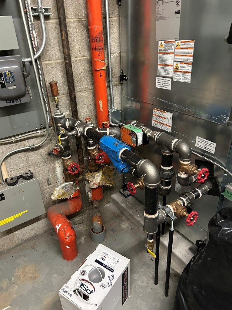 Old school boiler room piping before insulation