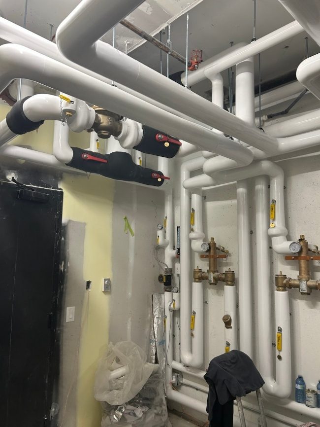 Insulated manifolds in a new boiler room